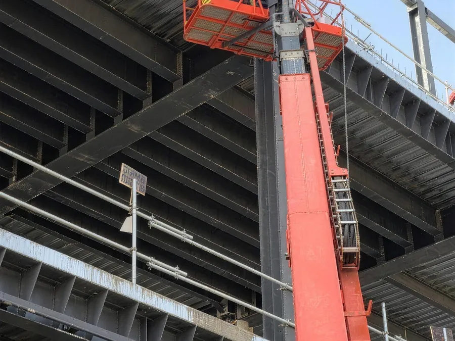 Boom-lift access under the structural steel deck of the data center