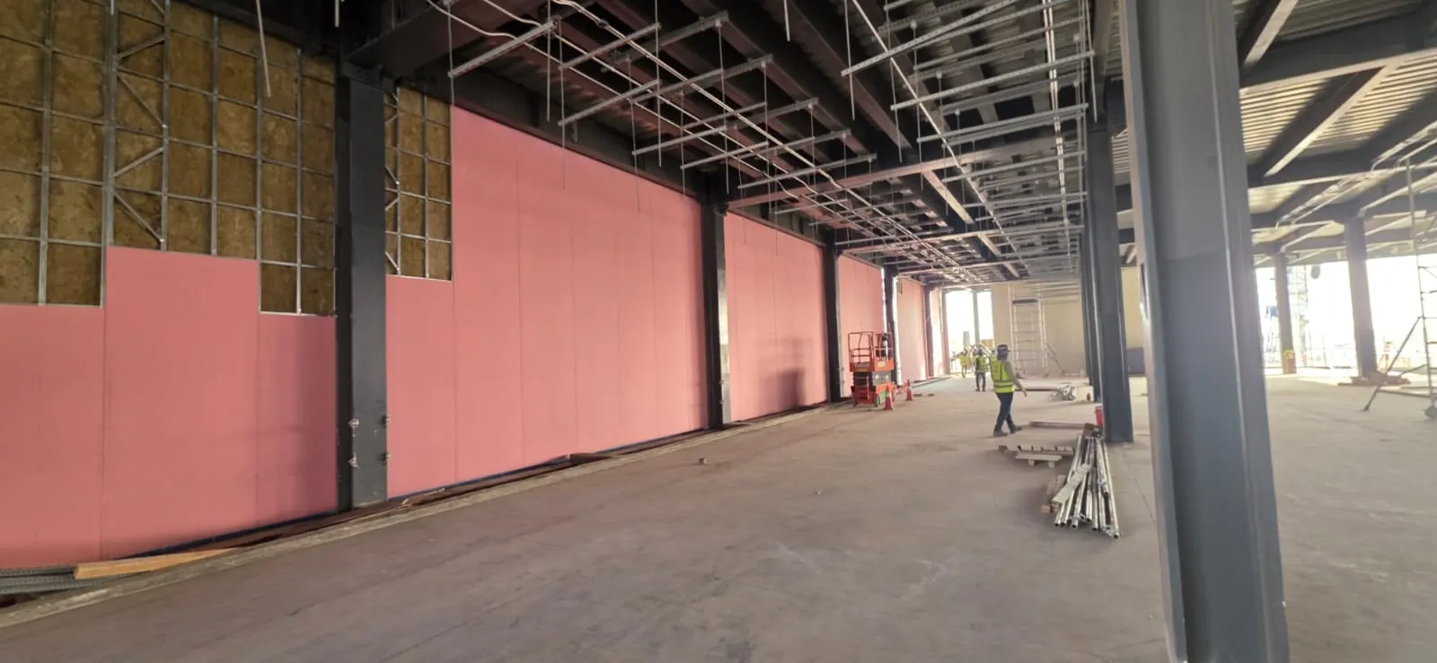 Fire-rated gypsum board installed over light-gauge steel studs and mineral wool insulation inside a data center in Riyadh